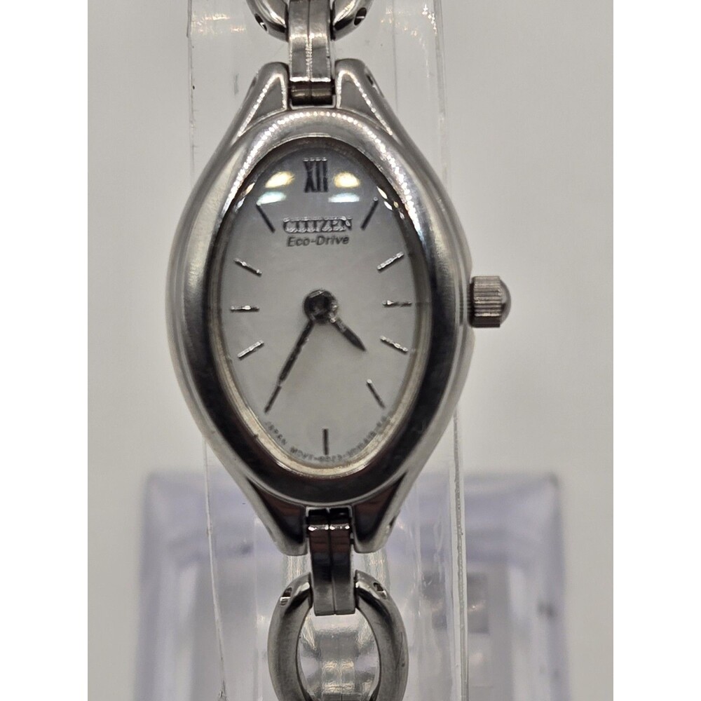 Citizen Eco-Drive Oval Silver Tone White Dial Heart Charm Bracelet Watch.
